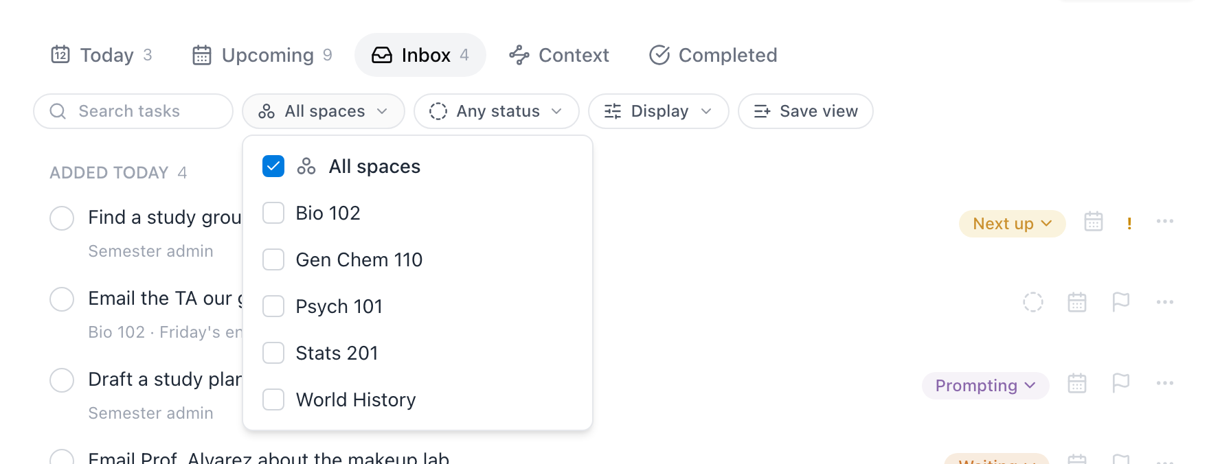 The Inbox tab with the space filter open, listing All spaces and each space with checkboxes